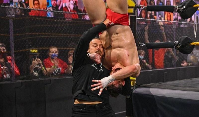 Kyle O'Reilly getting a brainbuster outside the ring.